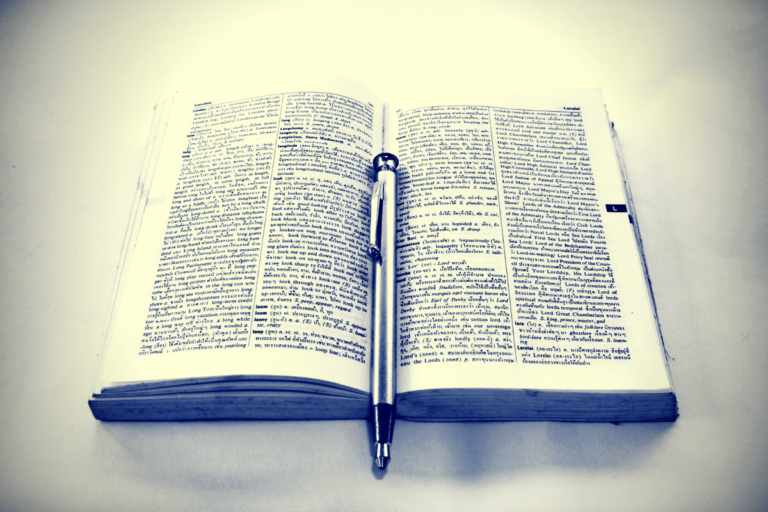 Open book with pen